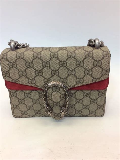 gucci snake clasped purse|Gucci bag with snake buckle.